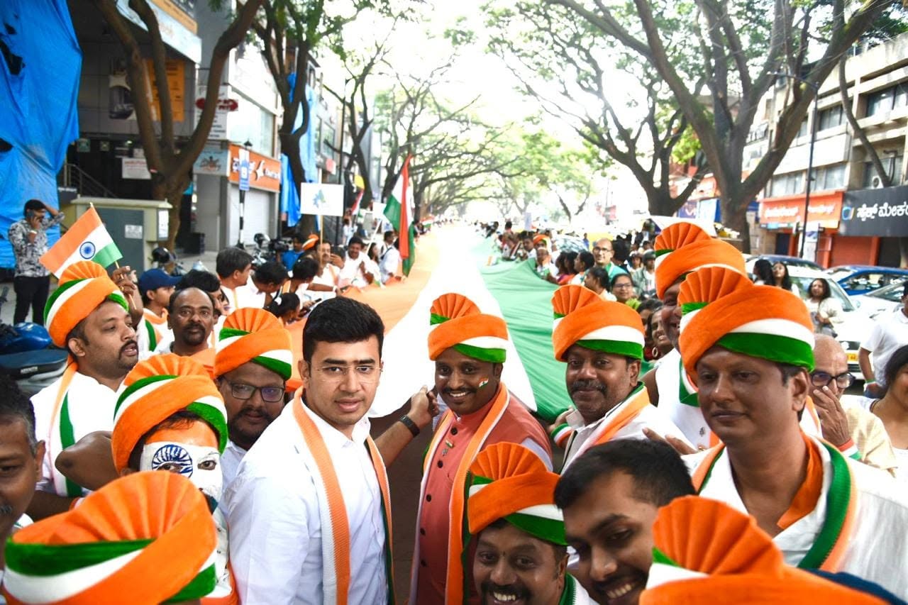 Walkers in tricolour turbans carrying the National Flag through Basavanagudi at a past Flagathon